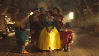 Rachel Zegler&#039;s Snow White surrounded by the seven dwarfs